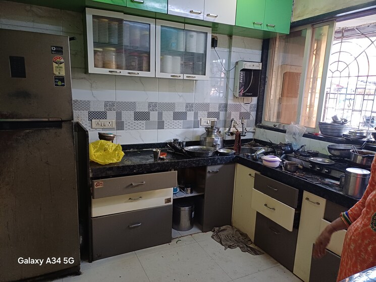 Kitchen, sector 6 kopar khairane 4 Bedroom 1350 Sq.Ft. Penthouse In Sector 6 Kopar Khairane Navi Mumbai 9787974
