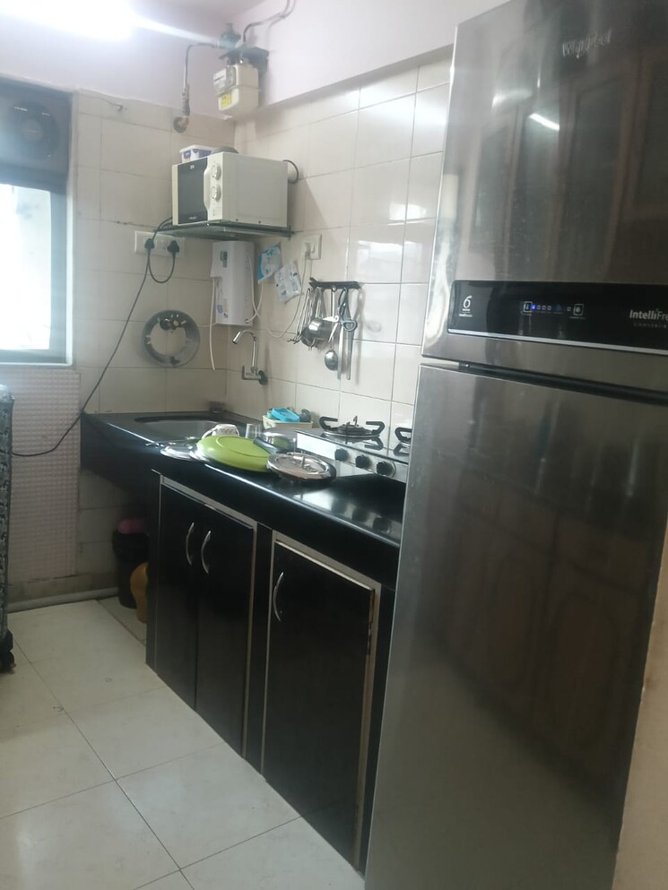 Kitchen, runwal-heights 2 Bedroom 700 Sq.Ft. Apartment In Mulund West Mumbai 9788024