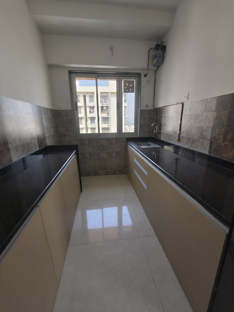 Kitchen, naman-premier 1 Bedroom 550 Sq.Ft. Apartment In Andheri East Mumbai 9788135