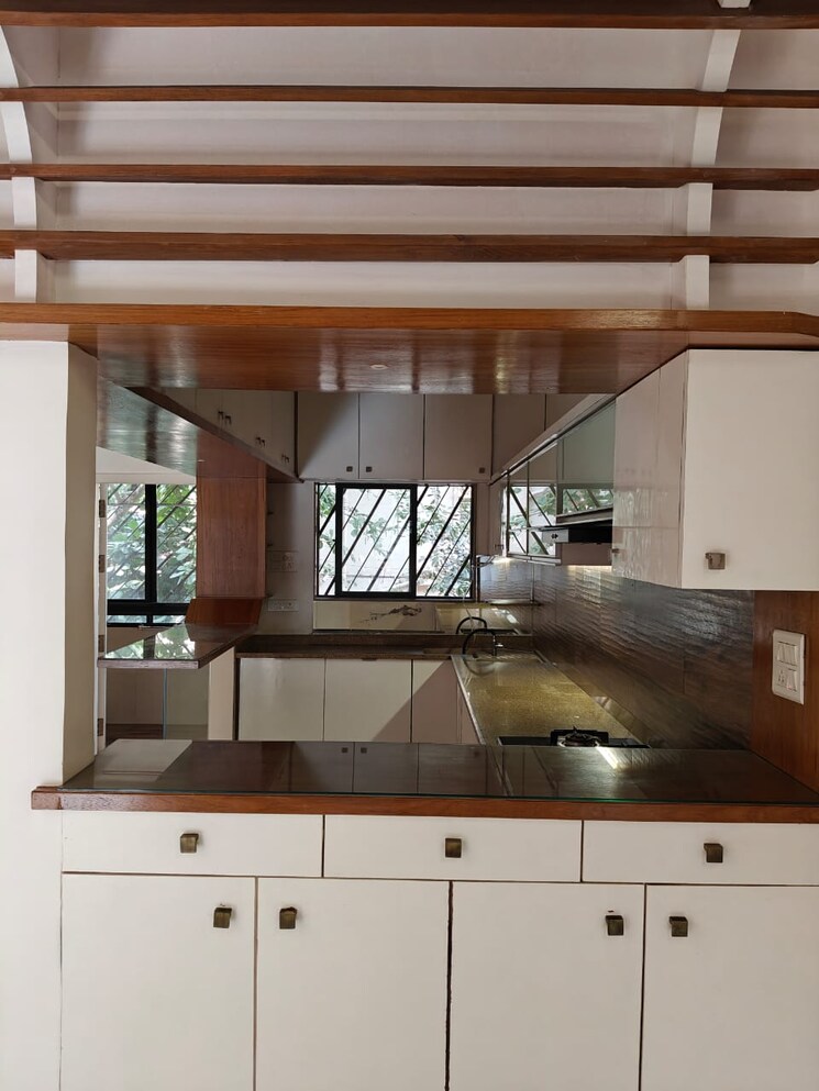 Kitchen, clover-trump 2 Bedroom 950 Sq.Ft. Apartment In Koregaon Park Pune 9788632