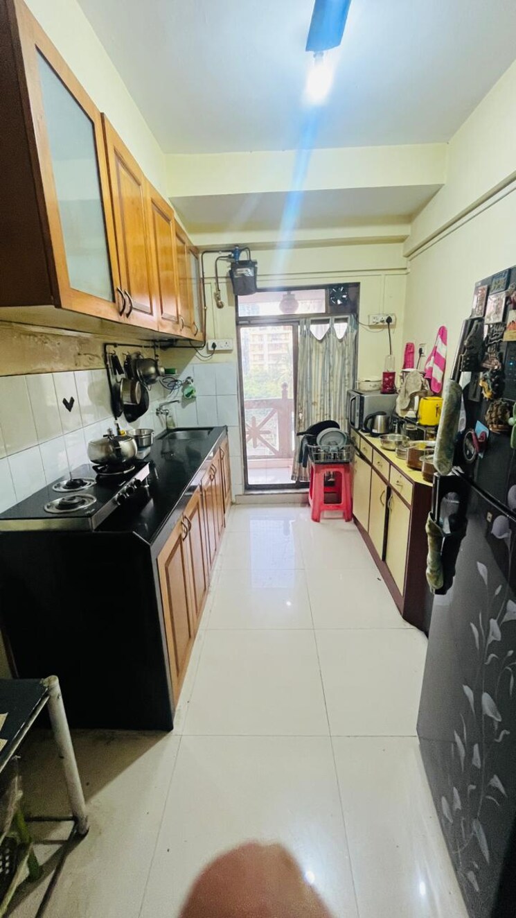 Kitchen, reminess-apartment 3 Bedroom 1500 Sq.Ft. Apartment In Bandra West Mumbai 9789486