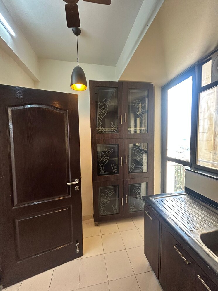 Kitchen, unitech-uniworld-gardens-2 3 Bedroom 1355 Sq.Ft. Apartment In Sector 47 Gurgaon 9790457