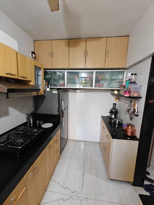 Kitchen in 2 BHK Apartment at Palash Towers, Andheri West – for Rent