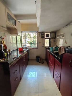 Kitchen in 2 BHK Apartment at Gurukrupa CHS Malad, Malad West – for Rent