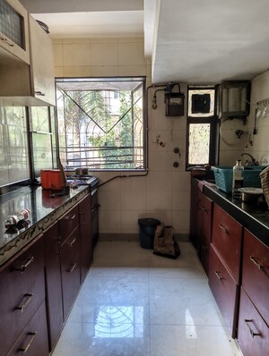Kitchen in 2 BHK Apartment at Gurukrupa CHS Malad, Malad West – for Rent