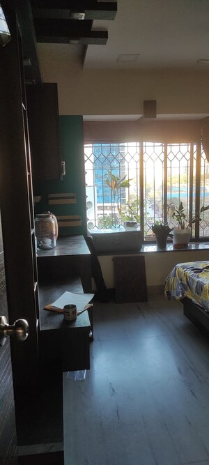 Living Room in 2 BHK Apartment at Palash Towers, Andheri West – for Rent