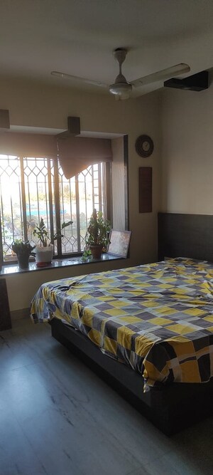 Bedroom in 2 BHK Apartment at Palash Towers, Andheri West – for Rent