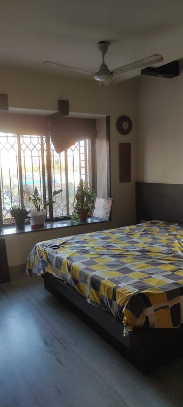 Bedroom in 2 BHK Apartment at Palash Towers, Andheri West – for Rent