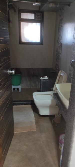 Bathroom in 2 BHK Apartment at Palash Towers, Andheri West – for Rent