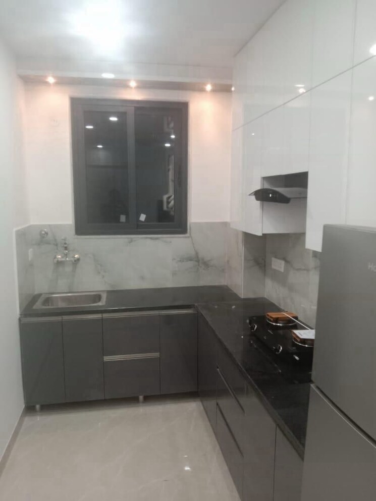 Kitchen, sector 56 2.5 Bedroom 180 Sq.Yd. Builder Floor In Sector 56 Gurgaon 9800391