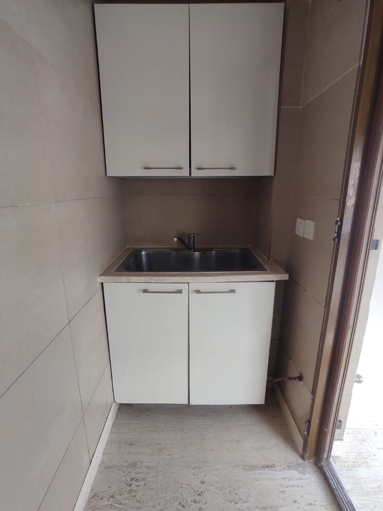 Kitchen, panchsheel park 4 Bedroom 500 Sq.Yd. Builder Floor In Panchsheel Park Delhi 9800583