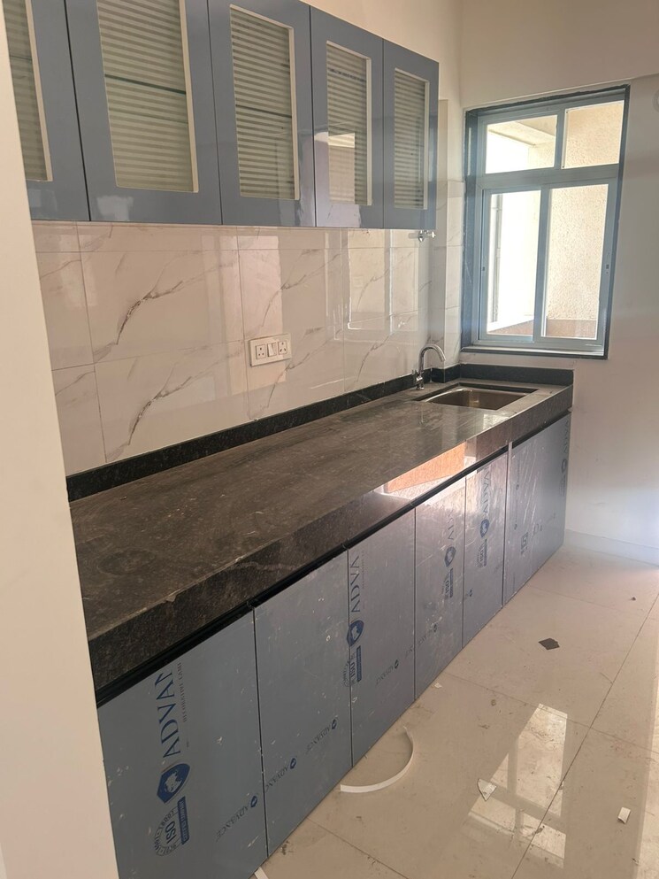 Kitchen, vrunda-shlok 3 Bedroom 1003 Sq.Ft. Apartment In Moshi Pune 9800715