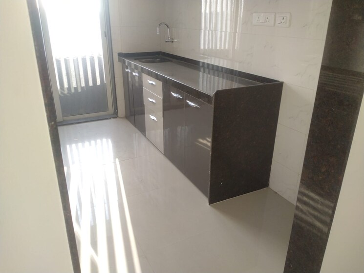 Kitchen, the-shreeji-atlantis 3 Bedroom 1050 Sq.Ft. Apartment In Malad West Mumbai 9801486