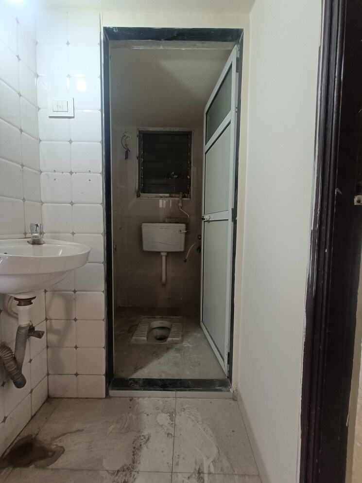Bathroom, seven-apna-ghar-phase-2-plot-b 1 Bedroom 504 Sq.Ft. Apartment In Mira Road Thane 9806430