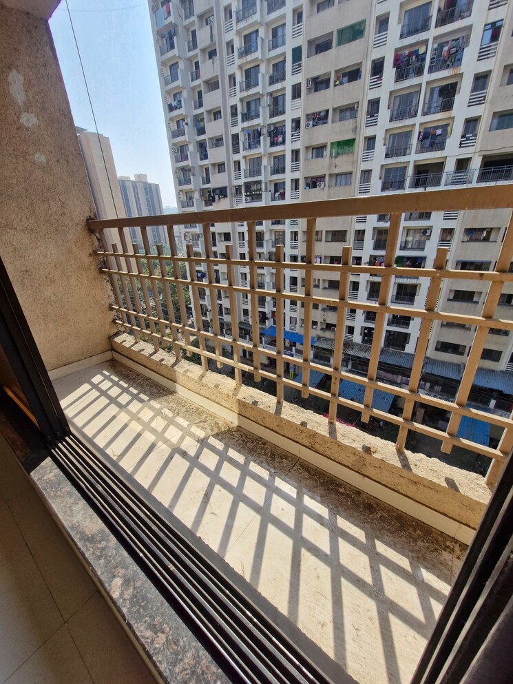 Balcony, kini-tower 1 Bedroom 445 Sq.Ft. Apartment In Virar West Palghar 9807018