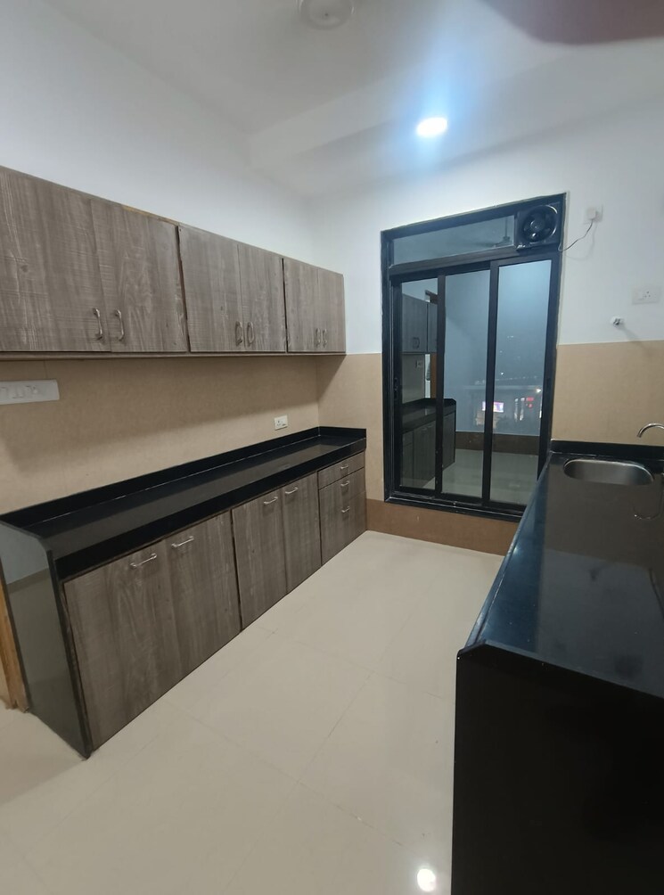 Kitchen, rustomjee-elanza 2 Bedroom 740 Sq.Ft. Apartment In Malad West Mumbai 9808589