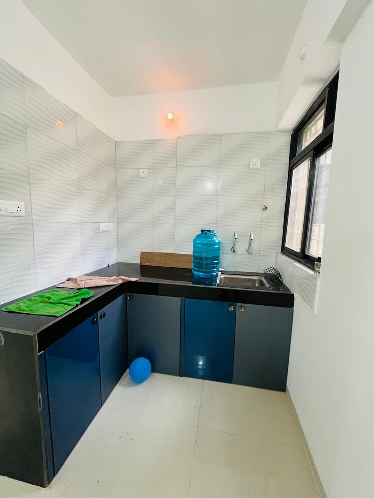 Kitchen, oxy-beaumonde 1 Bedroom 680 Sq.Ft. Apartment In Viman Nagar Pune 9809588