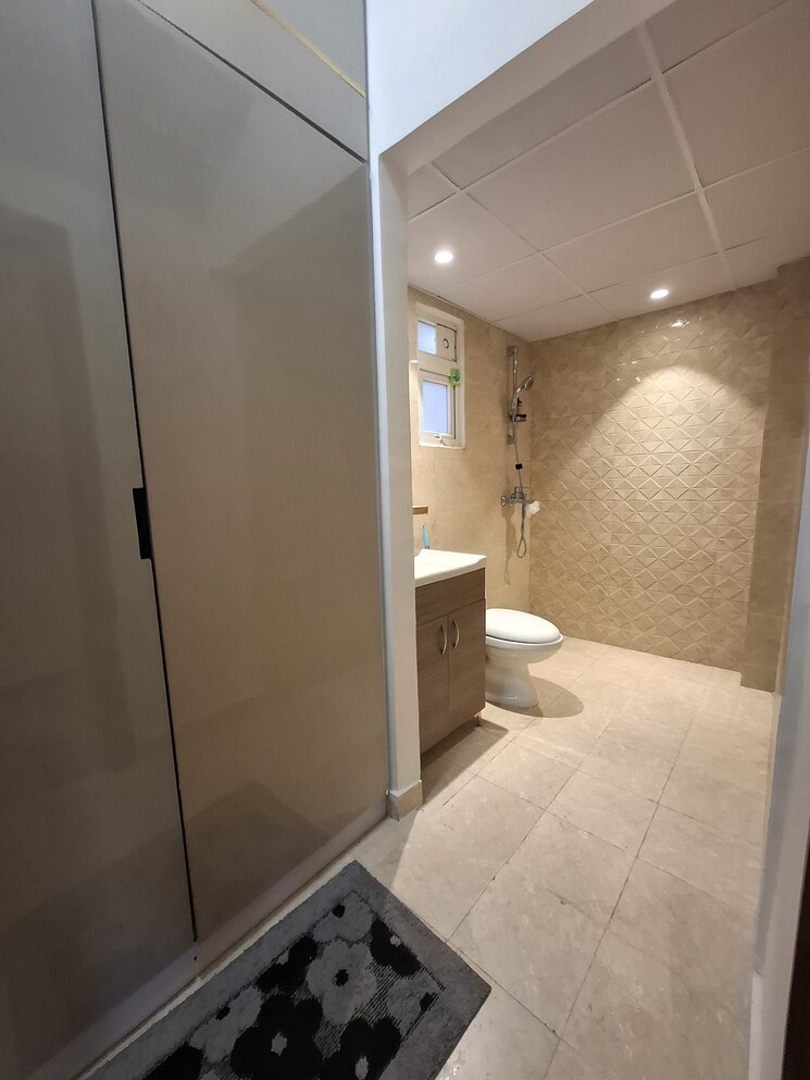 Bathroom, tulip-yellow 3 Bedroom 1704 Sq.Ft. Apartment In Sector 69 Gurgaon 9809623