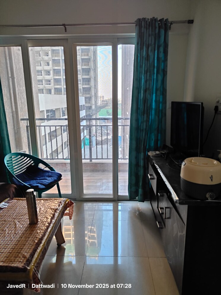 Living Room, kolte-patil-life-republic-arezo 2 Bedroom 650 Sq.Ft. Apartment In Hinjewadi Pune 9809671