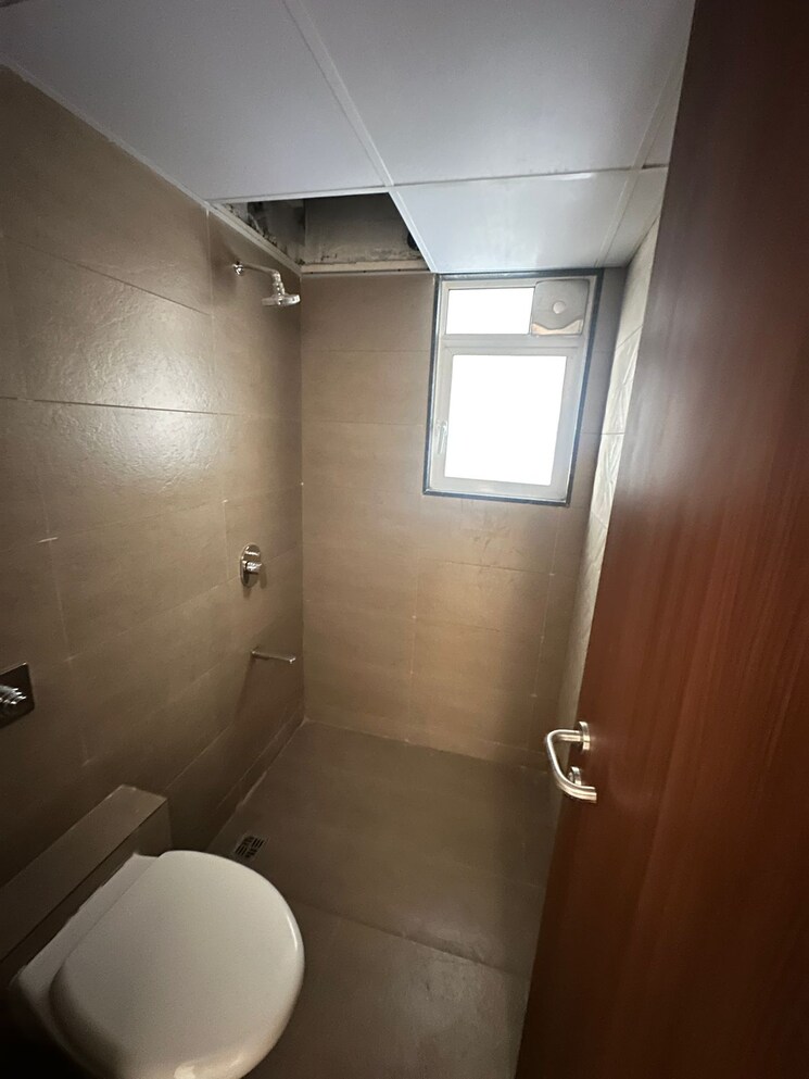 Bathroom, pride-purple-park-titan 3 Bedroom 1000 Sq.Ft. Apartment In Hinjewadi Pune 9810369