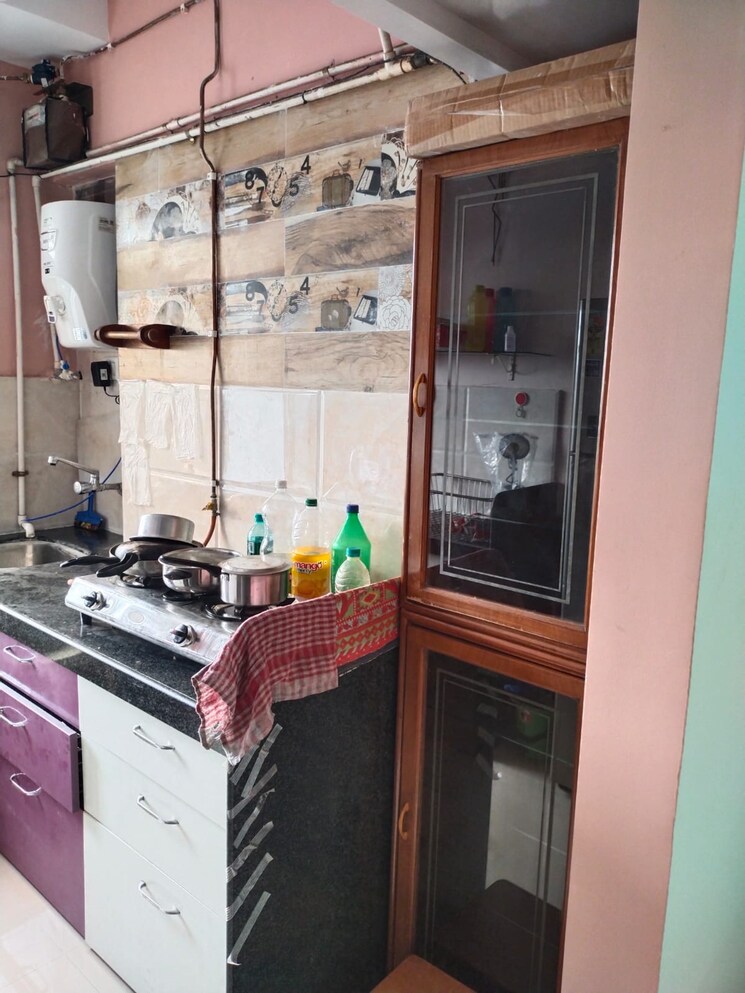 Kitchen, vakratunda-adityamaan 2 Bedroom 900 Sq.Ft. Apartment In Jb Nagar Mumbai 9810633