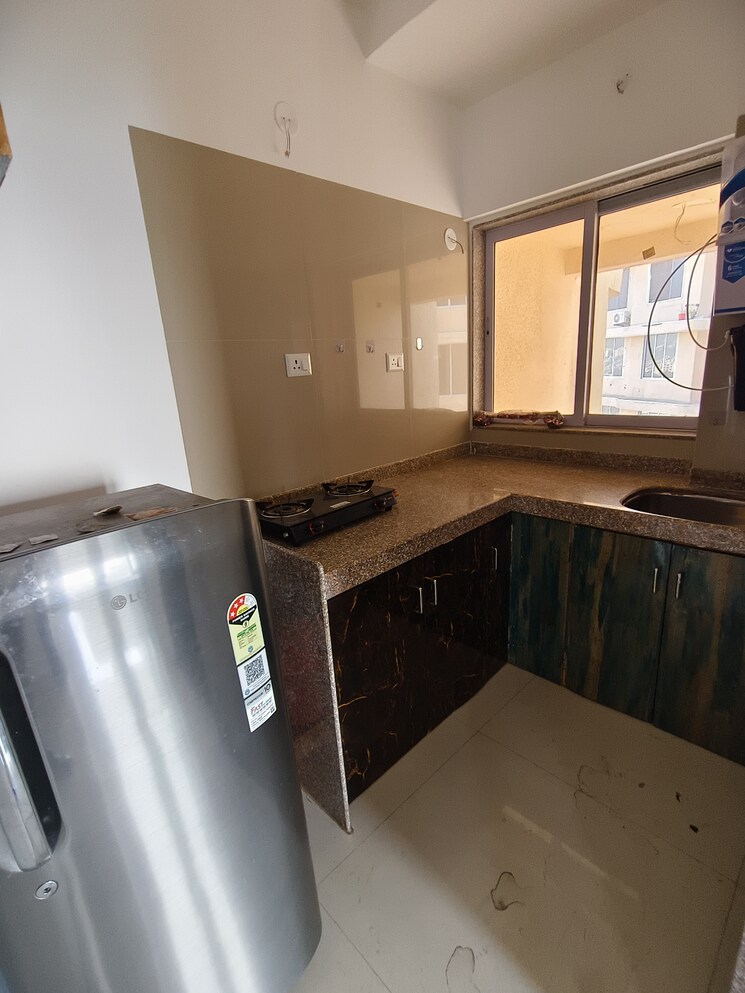 Kitchen, avant-hillway 1 Bedroom 450 Sq.Ft. Apartment In Goregaon East Mumbai 9812139