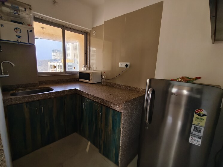 Kitchen, avant-hillway 1 Bedroom 400 Sq.Ft. Apartment In Goregaon East Mumbai 9812153