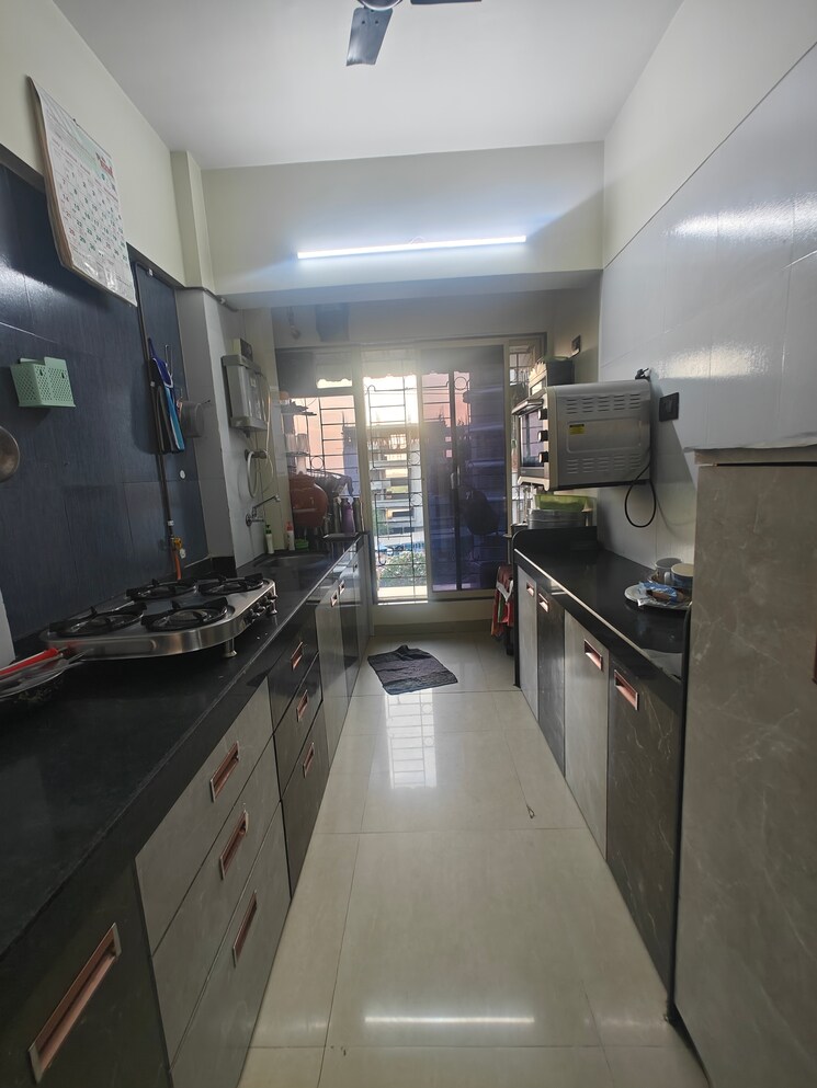 Kitchen, innovative-r-k-residency 2 Bedroom 1010 Sq.Ft. Apartment In Nerul Navi Mumbai 9812936