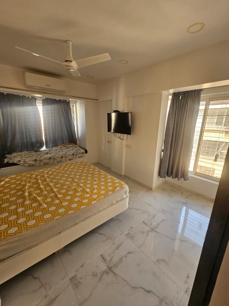 Bedroom, om-viraj-apartment 1 Bedroom 715 Sq.Ft. Apartment In Andheri West Mumbai 9815688
