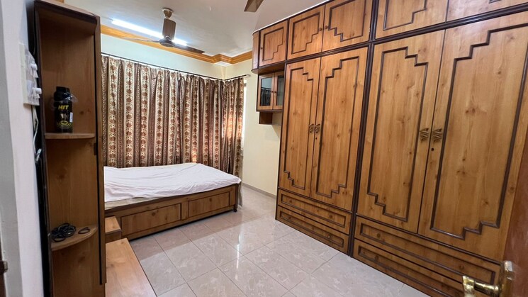 Master Bedroom, marathon-galaxy 2 Bedroom 800 Sq.Ft. Apartment In Mulund West Mumbai 9816497
