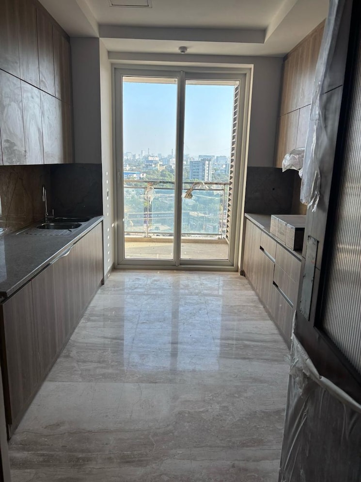 Kitchen, ambience-creacions 4 Bedroom 3975 Sq.Ft. Apartment In Sector 22 Gurgaon 9818040