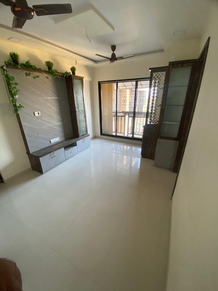 Living Room, raunak-unnathi-woods-phase-7-a-and-b 1 Bedroom 416 Sq.Ft. Apartment In Ghodbunder Road Thane 9818294