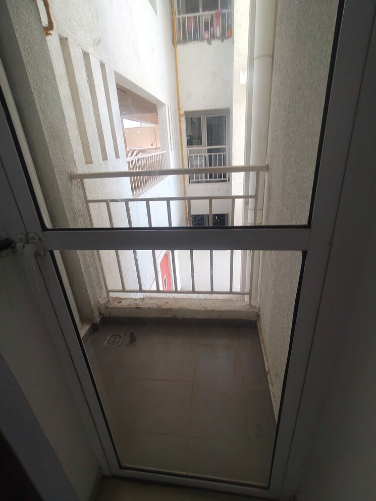 Balcony, godrej-greens 2 Bedroom 613 Sq.Ft. Apartment In Undri Pune 9819345