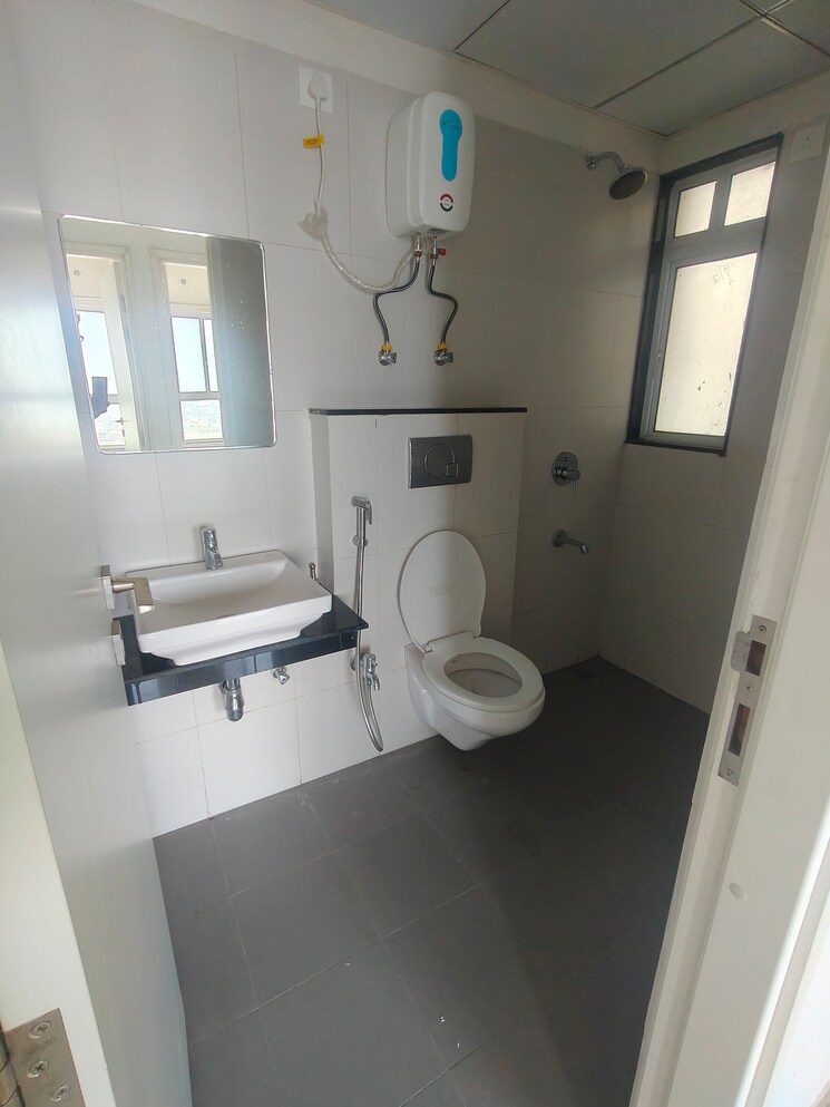 Bathroom, godrej-greens 2 Bedroom 613 Sq.Ft. Apartment In Undri Pune 9819345