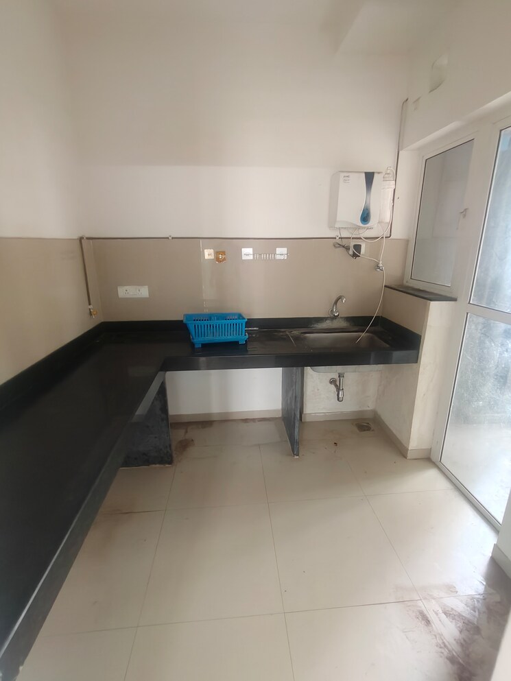 Kitchen, godrej-greens 2 Bedroom 563 Sq.Ft. Apartment In Undri Pune 9819347