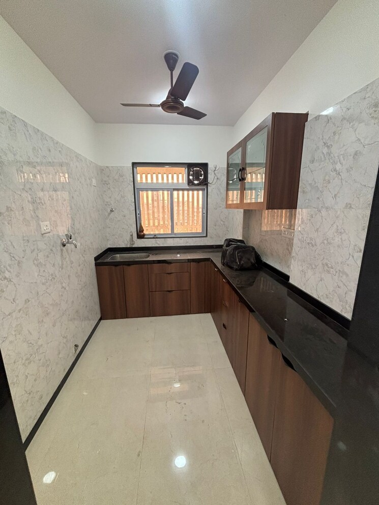 Kitchen, aditya-phatak-wada 2 Bedroom 700 Sq.Ft. Apartment In Tembhi Naka Thane 9819354