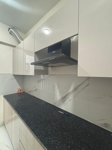 Kitchen in 2.5 BHK Apartment at Smart World Gems, Sector 89 – for Rent