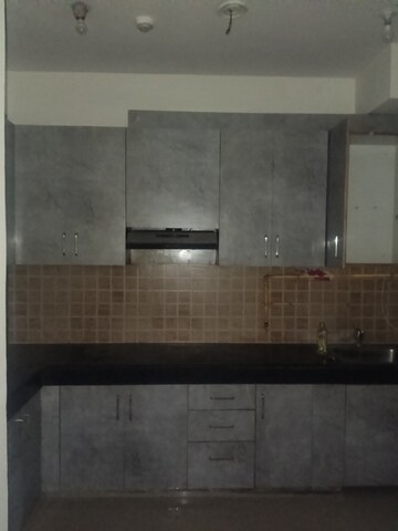 Kitchen in 2.5 BHK Apartment at Mahagun Mywoods, Sector 16c Greater Noida – for Sale