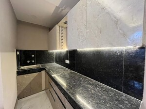 Kitchen in 2 BHK Builder Floor at Freedom Fighters Enclave – for Rent