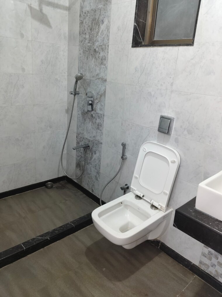 Bathroom, raj-infinia 2 Bedroom 750 Sq.Ft. Apartment In Malad West Mumbai 9831853