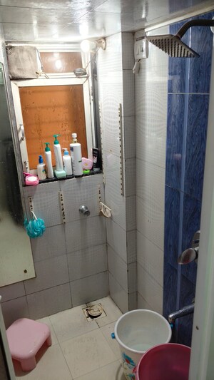 Bathroom in 1 BHK Apartment at Manish Sun Flower Apartment, Andheri West – for Rent