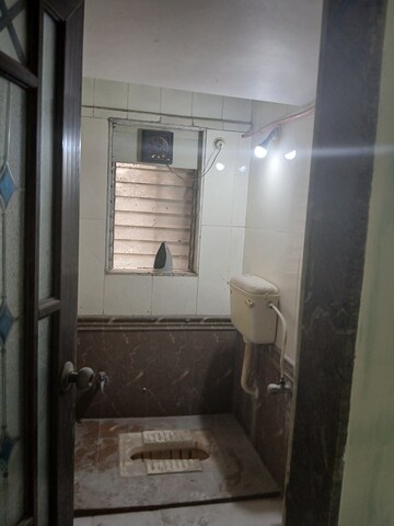 Kitchen in 1 BHK Apartment at Swastik Palms CHS, Brahmand – for Rent