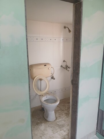 Bathroom in 1 BHK Apartment at Swastik Palms CHS, Brahmand – for Rent