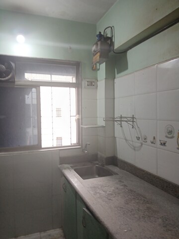 Kitchen in 1 BHK Apartment at Swastik Palms CHS, Brahmand – for Rent