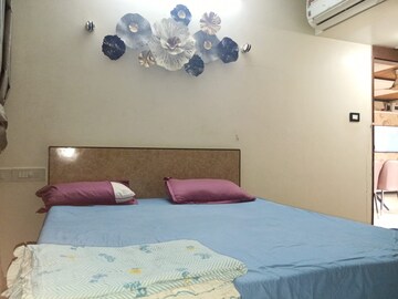 Bedroom in 2 BHK Apartment at Kanakia Rainforest, Andheri East – for Rent