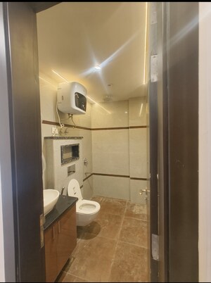 Bathroom in 4 BHK Builder Floor at Chattarpur – for Rent