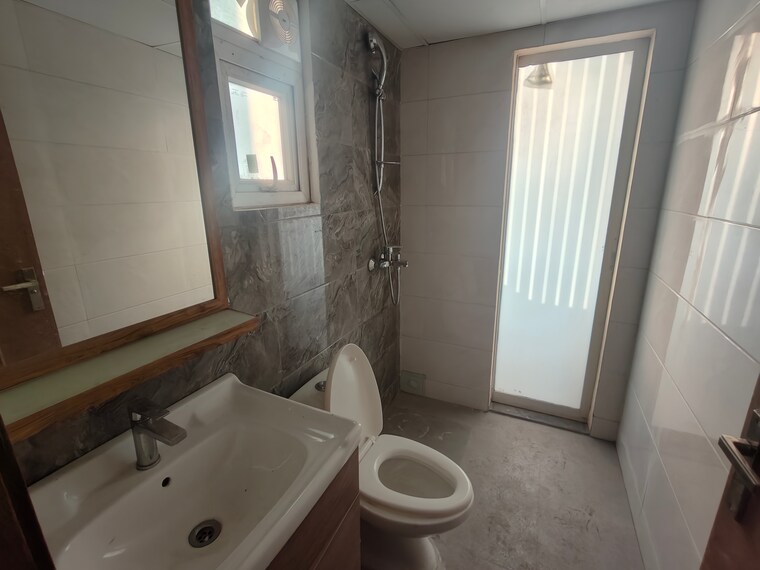 Bathroom, tulip-yellow 3 Bedroom 1704 Sq.Ft. Apartment In Sector 69 Gurgaon 9832151