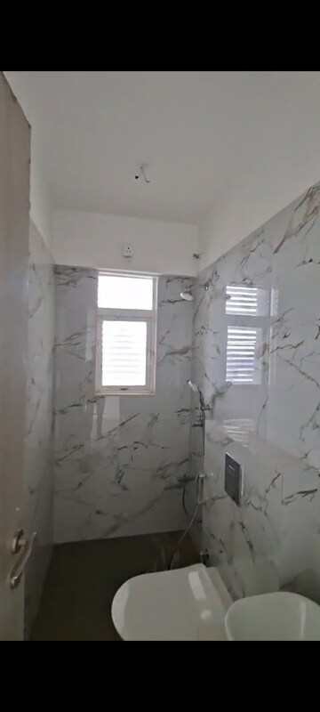 Bathroom in 2 BHK Apartment at OM Navratna CHS, Vile Parle East – for Rent