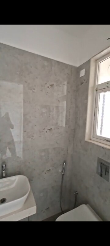 Bathroom in 2 BHK Apartment at OM Navratna CHS, Vile Parle East – for Rent