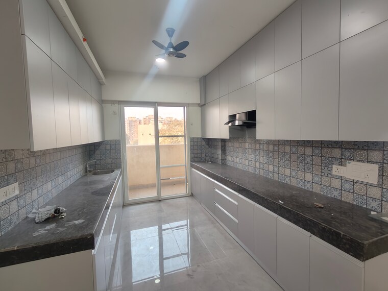 Kitchen, tulip-yellow 3 Bedroom 1704 Sq.Ft. Apartment In Sector 69 Gurgaon 9832199